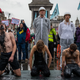 Extinction Rebellion protesters douse themselves in fake oil in London’s Trafalgar Square.